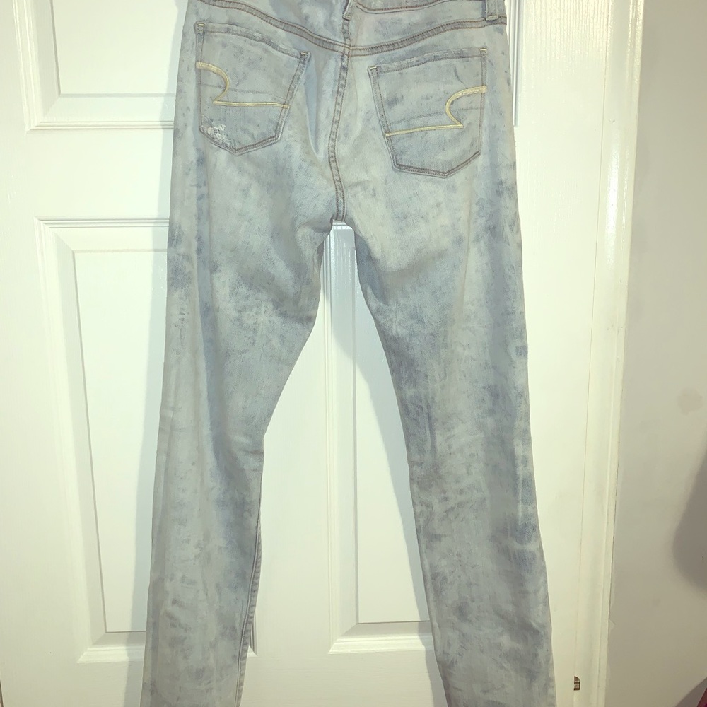 Ash wash destroyed skinny jeans